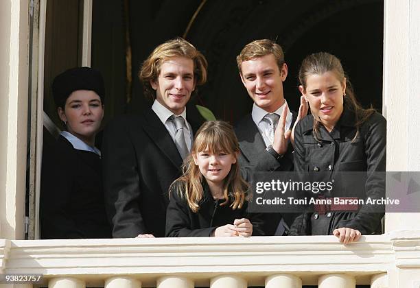 Andrea Casiraghi , Princess Alexandra of Hanover , Pierre Casiraghi and Charlotte Casiraghi wave from the balcony at the Palace after the Mass on...