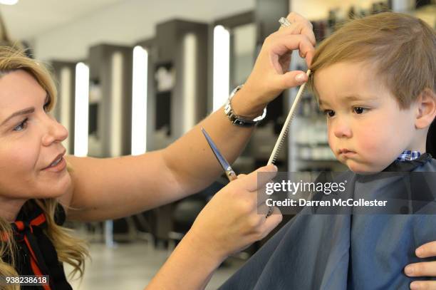 Evan gets a haircut from Marisa Marino to kick off HAIRraising, benefitting Boston Children's Hospital, at Stilisti on March 26, 2018 in Boston,...