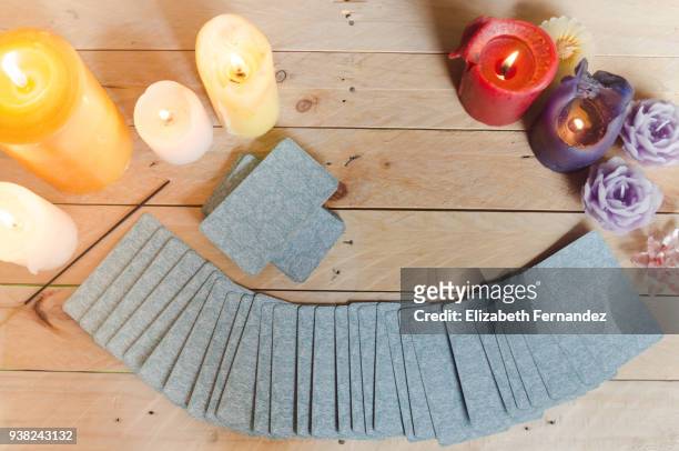tarot cards on wooden table. fortune teller. - carte tarot photos et images de collection