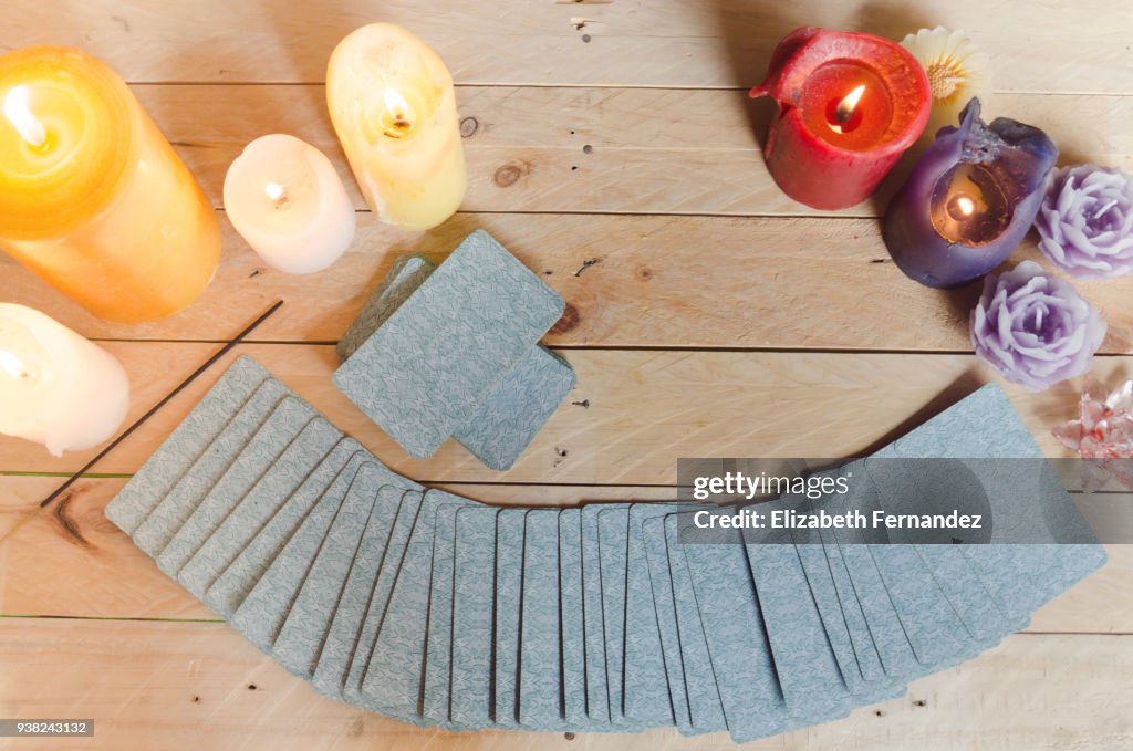 Tarot cards on wooden table. Fortune teller.