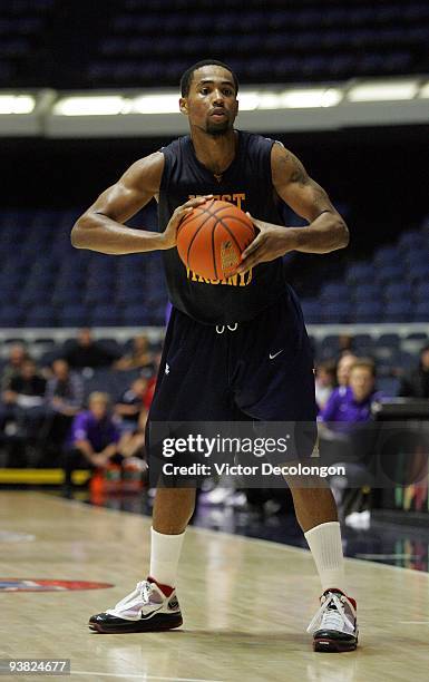 Da'Sean Butler of West Virginia looks to make a pass play during the 76 Classic Championship game against Portland at Anaheim Convention Center on...