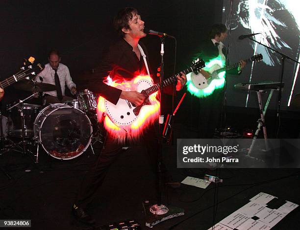 Dan Konopka, Damian Kulash and Andy Ross of OK Go performs during Fendi Design Miami-Stereo Craft Design Performances on December 3, 2009 in Miami,...