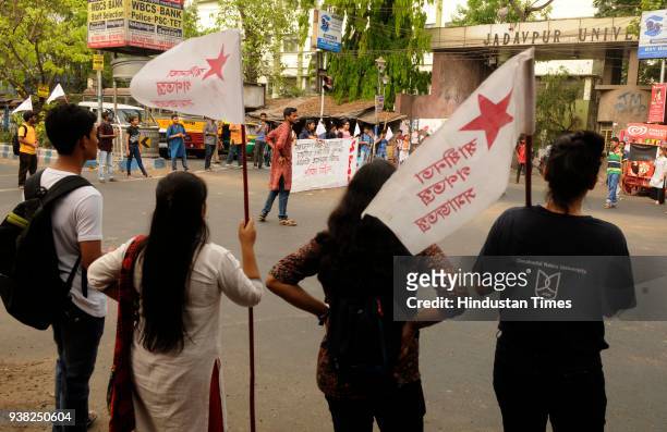 Students Federation of India , supporters of Jadavpur University took out a protest rally on recent police assault and manhandling on JNU students,...