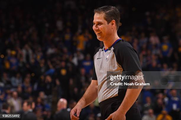 Referee, David Guthrie smiles during the Utah Jazz game against the Golden State Warriors on March 25, 2018 at ORACLE Arena in Oakland, California....