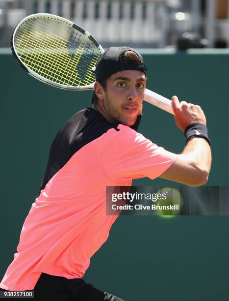 Thanasi Kokkinakis of Australia plays a backhand against Fernando Verdasco of Spain in their third round match during the Miami Open Presented by...