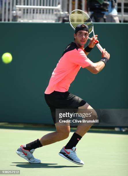 Thanasi Kokkinakis of Australia plays a backhand against Fernando Verdasco of Spain in their third round match during the Miami Open Presented by...