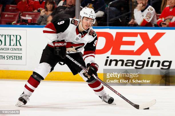 Clayton Keller of the Arizona Coyotes skates with the puck against the Florida Panthers at the BB&T Center on March 24, 2018 in Sunrise, Florida....