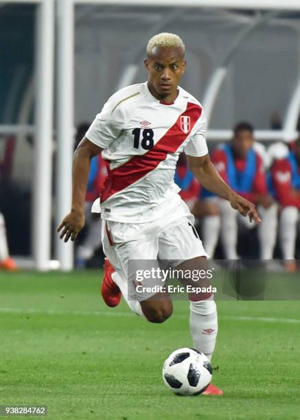 Andre Carrillo of Peru drives the ball during the international friendly match between Peru and Croatia at Hard Rock Stadium on March 23, 2018 in...