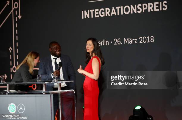 Nia Kuenzer and Gerald Asamoah speak to the audience during Integration Prize Awarding Ceremony at Axica Kongress- und Tagungszentrum on March 26,...