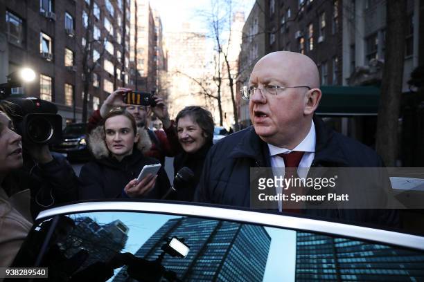 Russian Ambassador to the United Nations Vassily Nebenzia speaks to the media while getting into his car after a United Nations lunch on March 26,...