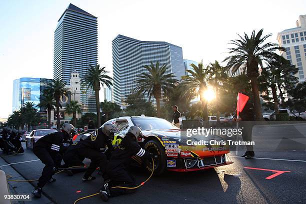 Greg Biffle, driver of the 3M Scotch Super 33 Tape Ford, pits during the Victory Lap of the NASCAR Sprint Cup Series Champions Week on December 3,...