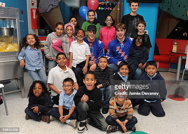 Sean Avery and Brandon Dubinsky of the New York Rangers host Garden Of Dreams Foundation event for 20 children at Dylan's Candy Bar on December 3,...