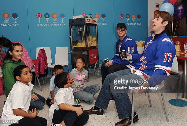 Sean Avery and Brandon Dubinsky of the New York Rangers host Garden Of Dreams Foundation event for 20 children at Dylan's Candy Bar on December 3,...