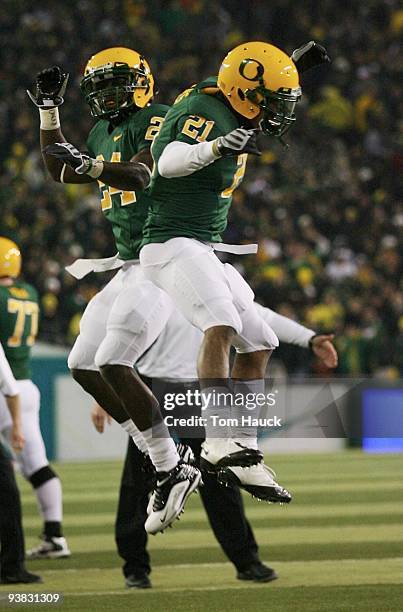 Running back LaMichael James of the Oregon Ducks celebrates with teammate Ryan McCants after scoring a touchdown against the Oregon State Beavers at...