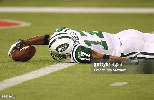 Braylon Edwards of the New York Jets scores a 13-yard touchdown reception in the second quarter against the Buffalo Bills at Rogers Centre on...