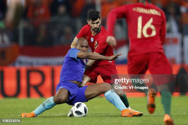 Ryan Babel of Holland, Luis Neto of Portugal during the International friendly match match between Portugal and The Netherlands at Stade de Genève on...