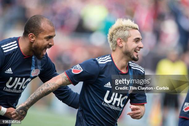 March 24: Diego Fagundez of New England Revolution is congratulated by Teal Bunbury of New England Revolution after scoring his sides first goal...