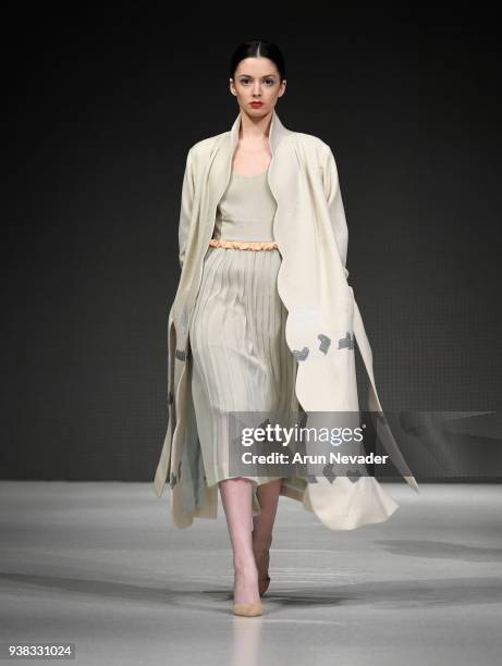 Model walks the runway wearing PYT at 2018 Vancouver Fashion Week - Day 4 on March 22, 2018 in Vancouver, Canada.