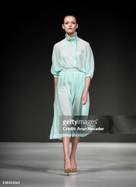 Model walks the runway wearing PYT at 2018 Vancouver Fashion Week - Day 4 on March 22, 2018 in Vancouver, Canada.