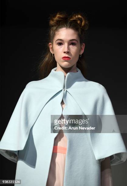 Model walks the runway wearing PYT at 2018 Vancouver Fashion Week - Day 4 on March 22, 2018 in Vancouver, Canada.