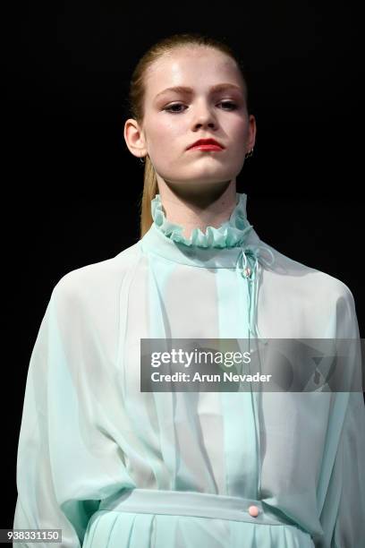 Model walks the runway wearing PYT at 2018 Vancouver Fashion Week - Day 4 on March 22, 2018 in Vancouver, Canada.