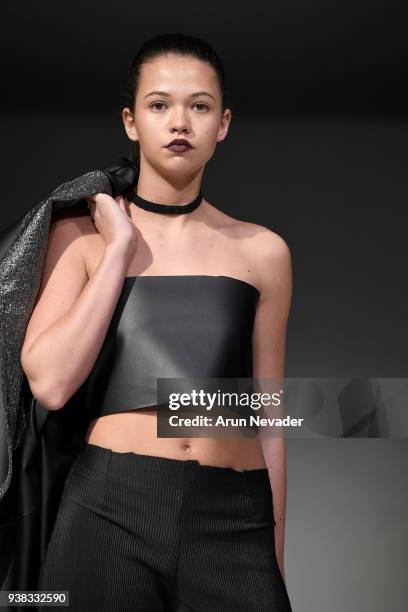 Model walks the runway wearing Wet Ink at 2018 Vancouver Fashion Week - Day 4 on March 22, 2018 in Vancouver, Canada.