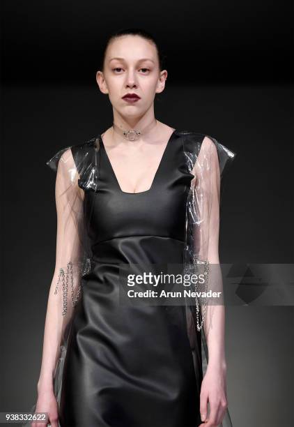 Model walks the runway wearing Wet Ink at 2018 Vancouver Fashion Week - Day 4 on March 22, 2018 in Vancouver, Canada.