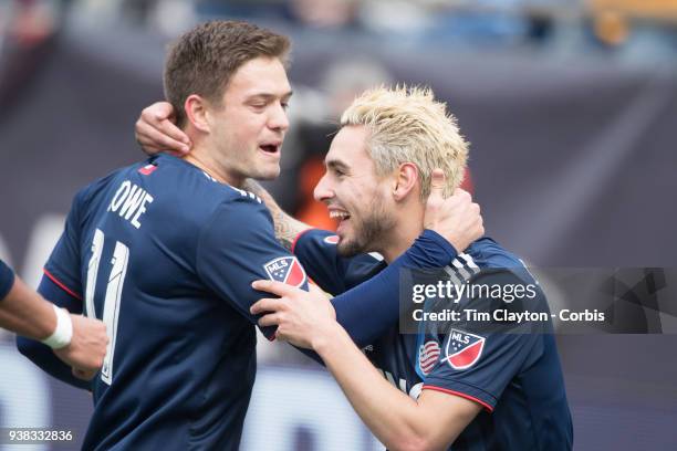 March 24: Diego Fagundez of New England Revolution is congratulated by Kelyn Rowe of New England Revolution after scoring his sides first goal during...