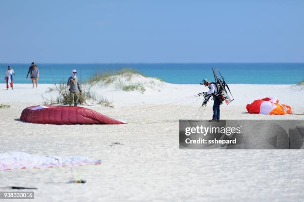 powered paragliding setup at pensacola beach in florida - motor paraglider stock pictures, royalty-free photos & images