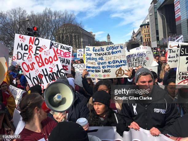 Marjory Stoneman Douglas High School Alumni march thru Washington DC as part of 'March For Our Lives'. Over 750,000 people gathered on Pennsylvania...