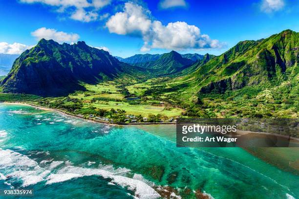 aerial view of kualoa area of oahu hawaii - scenics stock pictures, royalty-free photos & images