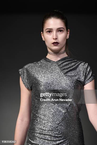 Model walks the runway wearing Wet Ink at 2018 Vancouver Fashion Week - Day 4 on March 22, 2018 in Vancouver, Canada.