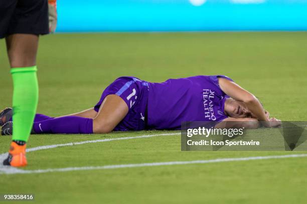 Orlando Pride forward Alex Morgan waits for medical attention after colliding with Utah Royals FC goalkeeper Abby Smith during the soccer match...