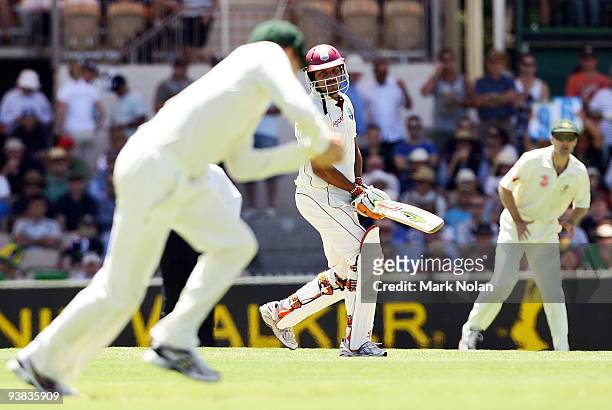 Ramnaresh Sarwan of the West Indies is caught by Michael Clarke of Australia during day one of the Second Test match between Australian and the West...
