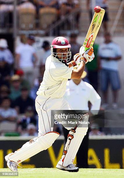 Ramnaresh Sarwan of the West Indies plays a shot square of the wicket and is caught by Michael Clarke of Australia during day one of the Second Test...