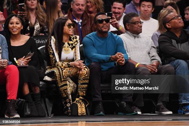 Taraji P. Henson and Lyriq Bent attend the game between the Cleveland Cavaliers and the Brooklyn Nets at Barclays Center on March 25, 2018 in the...