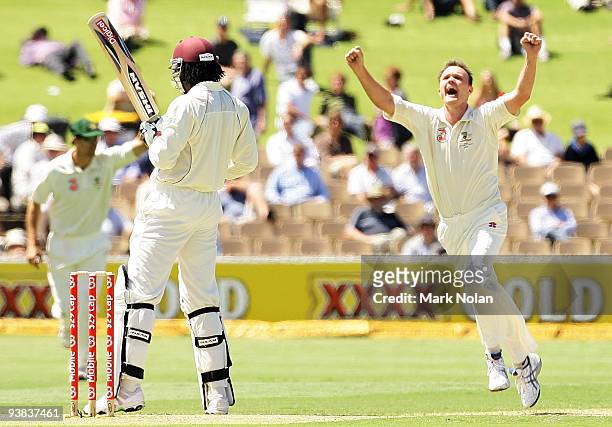 Doug Bollinger of Australia celebrates dismissing Chris Gayle of the West Indies during day one of the Second Test match between Australian and the...