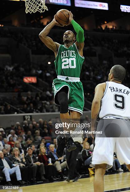 Guard Ray Allen of the Boston Celtics takes a shot against Tony Parker of the San Antonio Spurs on December 3, 2009 at AT&T Center in San Antonio,...