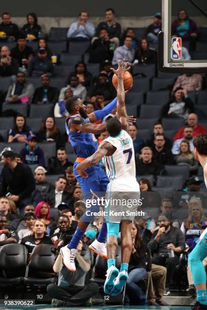 Tim Hardaway Jr. #3 of the New York Knicks shoots a lay up against the Charlotte Hornets on March 26, 2018 at Spectrum Center in Charlotte, North...