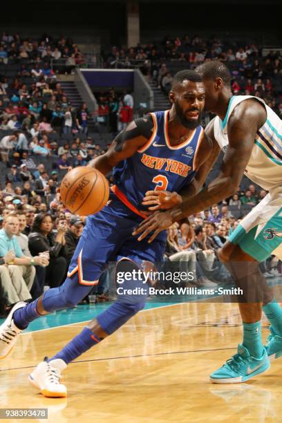 Tim Hardaway Jr. #3 of the New York Knicks handles the ball against the Charlotte Hornets on March 26, 2018 at Spectrum Center in Charlotte, North...