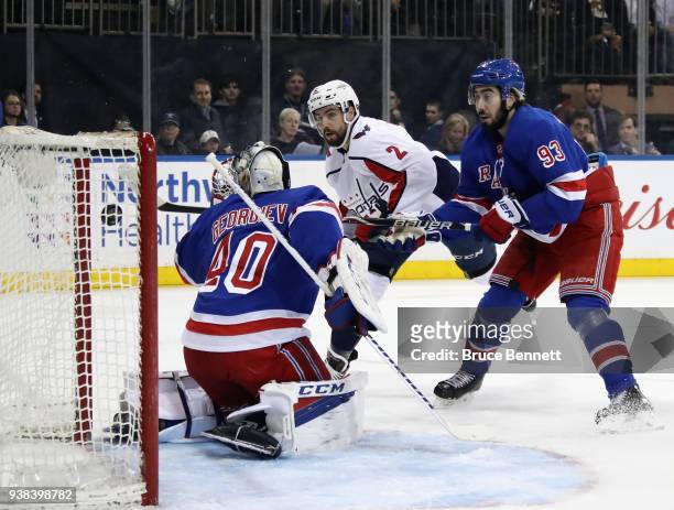 Matt Niskanen of the Washington Capitals scores at 5:13 of the first period against Alexandar Georgiev of the New York Rangers at Madison Square...