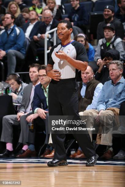 Referee Bill Kennedy looks on during the game between the Memphis Grizzlies and Minnesota Timberwolves on March 26, 2018 at Target Center in...