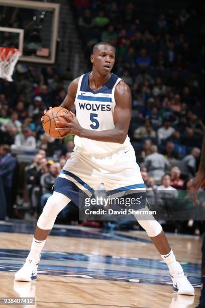 Gorgui Dieng of the Minnesota Timberwolves handles the ball during the game against the Memphis Grizzlies on March 26, 2018 at Target Center in...