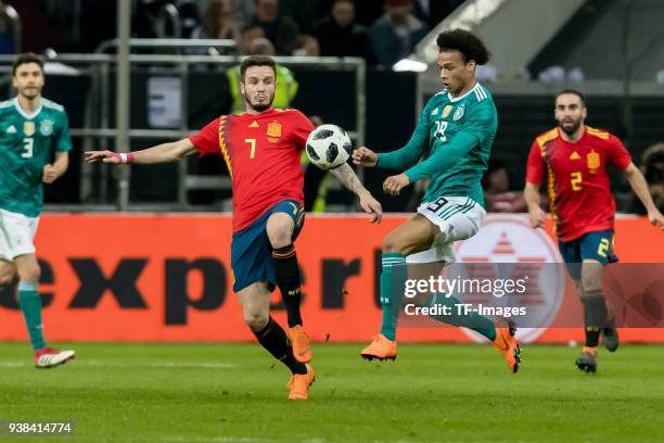 Saul Niguez of Spain and Leroy Sane of Germany battle for the ball during the international friendly match between Germany and Spain at Esprit-Arena...