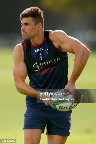 Tom English passes the ball during a Melbourne Rebels Super Rugby training session at Goschs Paddock on March 27, 2018 in Melbourne, Australia.