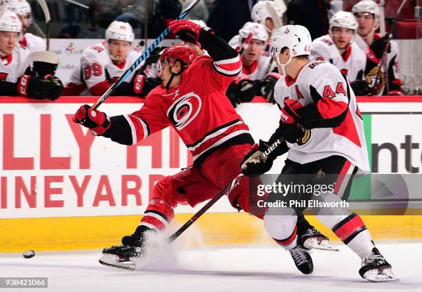 Jean-Gabriel Pageau of the Ottawa Senators is tangled with Sebastian Aho as they battle for the puck during an NHL game on March 26, 2016 at PNC...