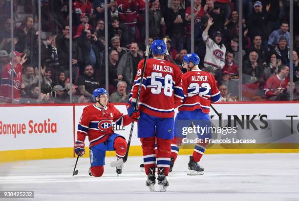 Brendan Gallagher of the Montreal Canadiens celebrates after scoring a goal against the Detroit Red Wings in the NHL game at the Bell Centre on March...