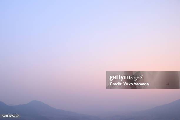 cloud typologies - clouds over romantic color sky in springtime - cloud typologies stock-fotos und bilder