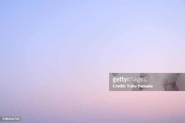 cloud typologies - clouds over romantic color sky in springtime - dusk fotografías e imágenes de stock