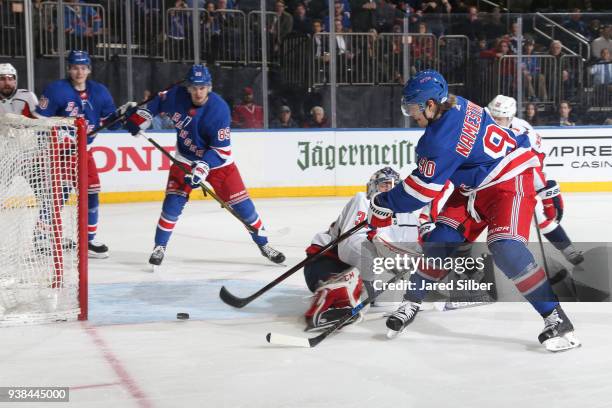 Vladislav Namestnikov of the New York Rangers shoots the puck wide of the net against Philip Grubauer of the Washington Capitals at Madison Square...